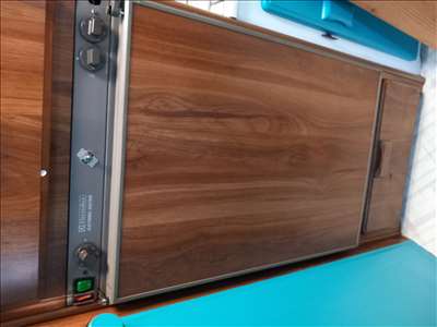 Voici un exemple d'une armoire réfrigérée à réparer