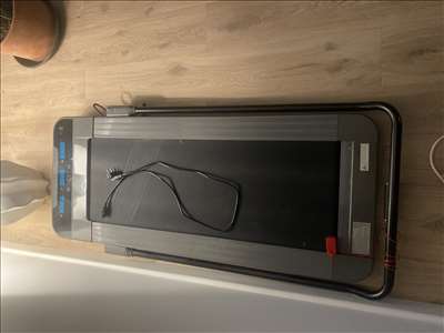 Voici un exemple d'un tapis de course à pied à réparer