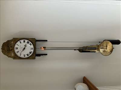 Voici un exemple d'une horloge à accrocher à réparer