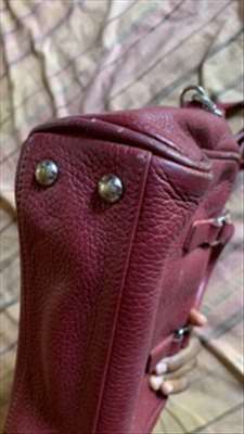 Annonce pour réparer un sac de luxe