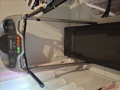 Voici un exemple d'un tapis de course à pied à réparer