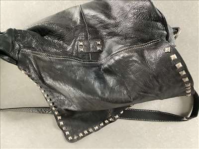 Exemple d'un sac de luxe à restaurer