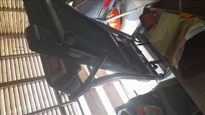 Voici un exemple d'un tapis de course à pied à réparer