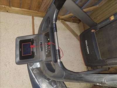 Voici un exemple d'un tapis de course à pied à réparer