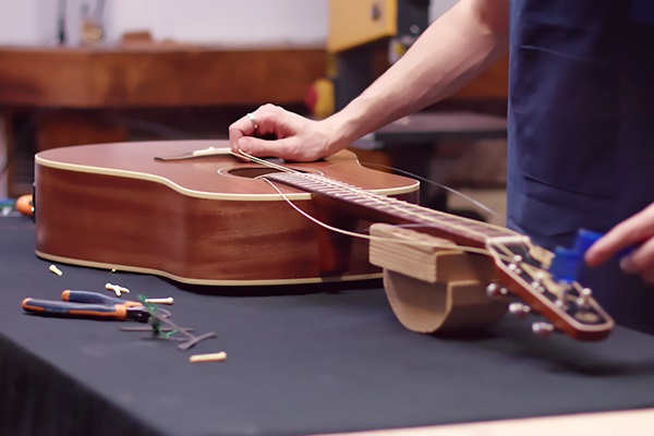 Faire réparer une guitare à proximité de Saint-Julien-en-Genevois