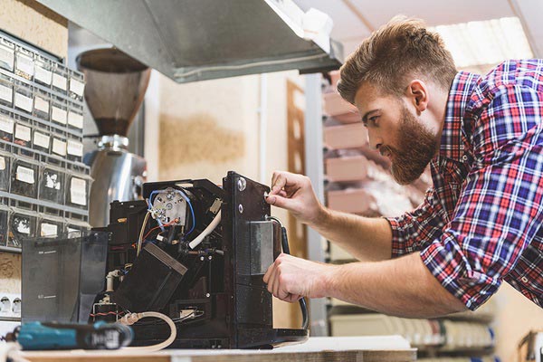 réparation de machine à café avec Optimal pro tech à Bouguenais
