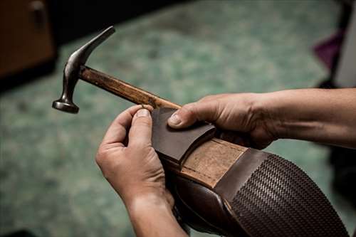Faire réparer une paire de souliers à Le Moule